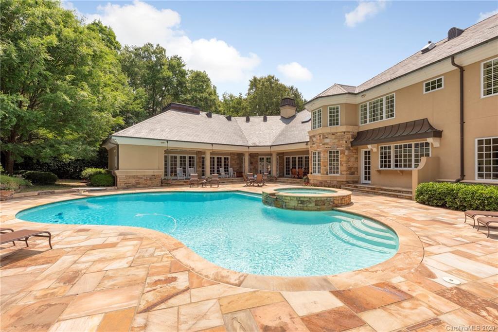 8333 Providence Road Charlotte, NC 28277 - Photo 40 of 47 a view of a house with swimming pool and yard