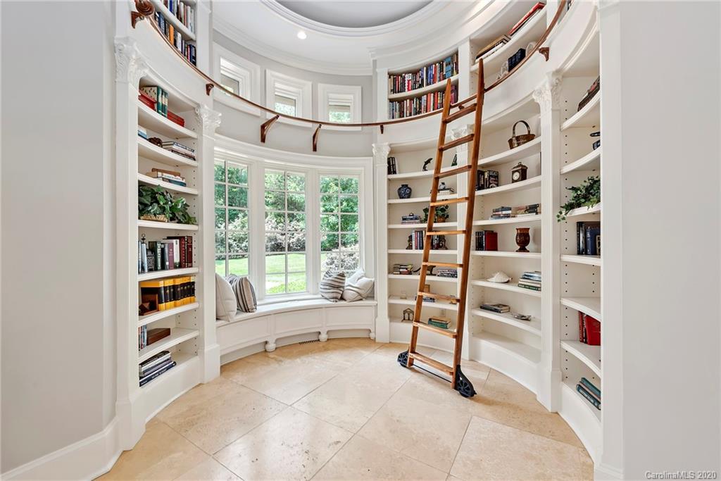 8333 Providence Road Charlotte, NC 28277 - Photo 5 of 47 a view of a livingroom with shelves
