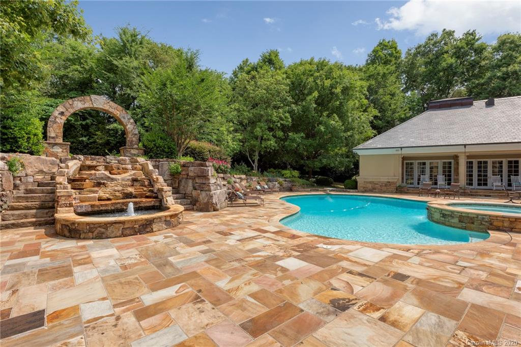 8333 Providence Road Charlotte, NC 28277 - Photo 41 of 47 a view of a house with pool and sitting area