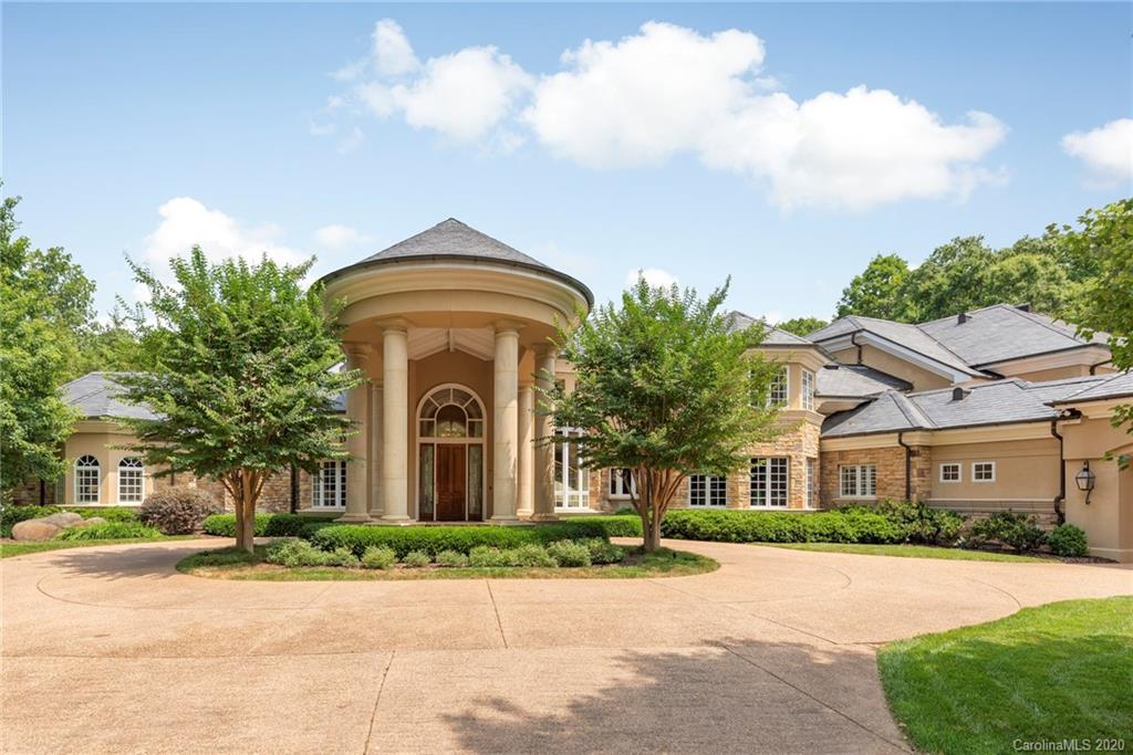 8333 Providence Road Charlotte, NC 28277 - Photo 43 of 47 front view of a brick house with a small yard