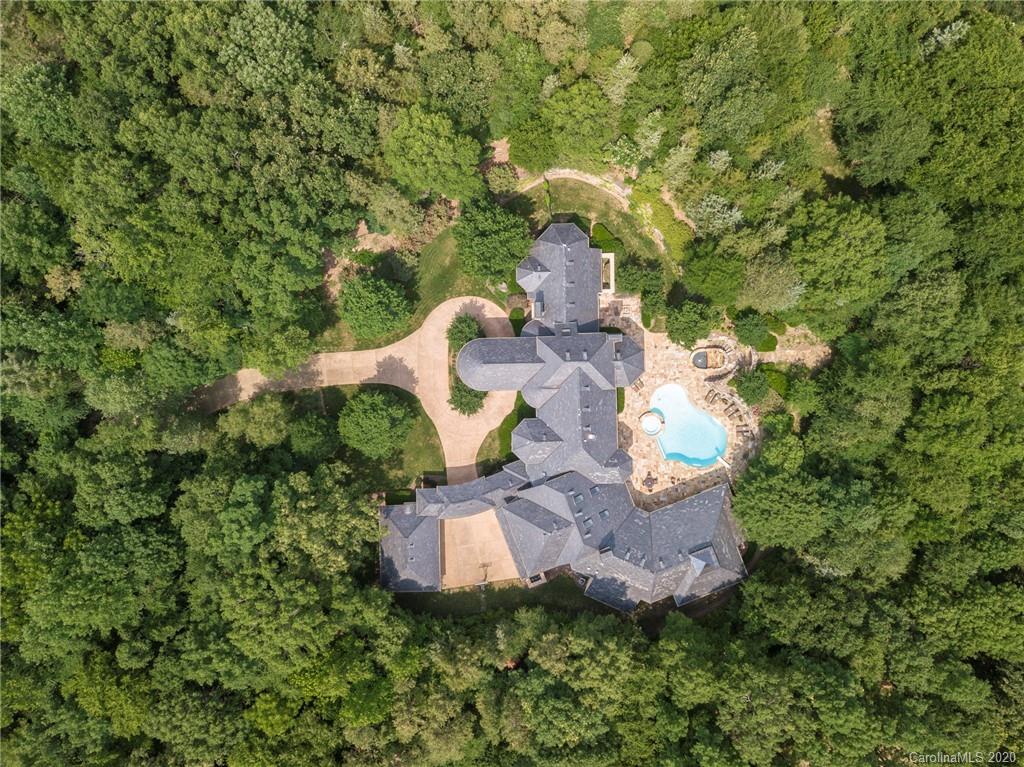 8333 Providence Road Charlotte, NC 28277 - Photo 45 of 47 an aerial view of a house with a yard and lake view