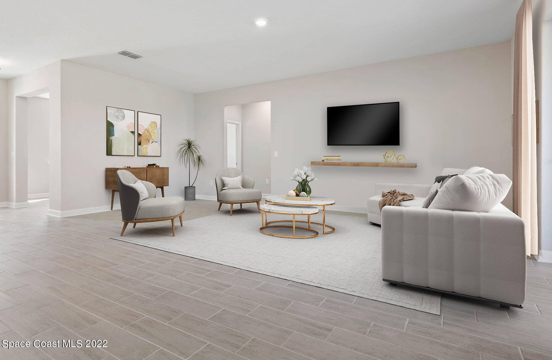 1275 Packer Road Southeast Palm Bay, FL 32909 - Photo 10 of 20 a living room with furniture and a flat screen tv