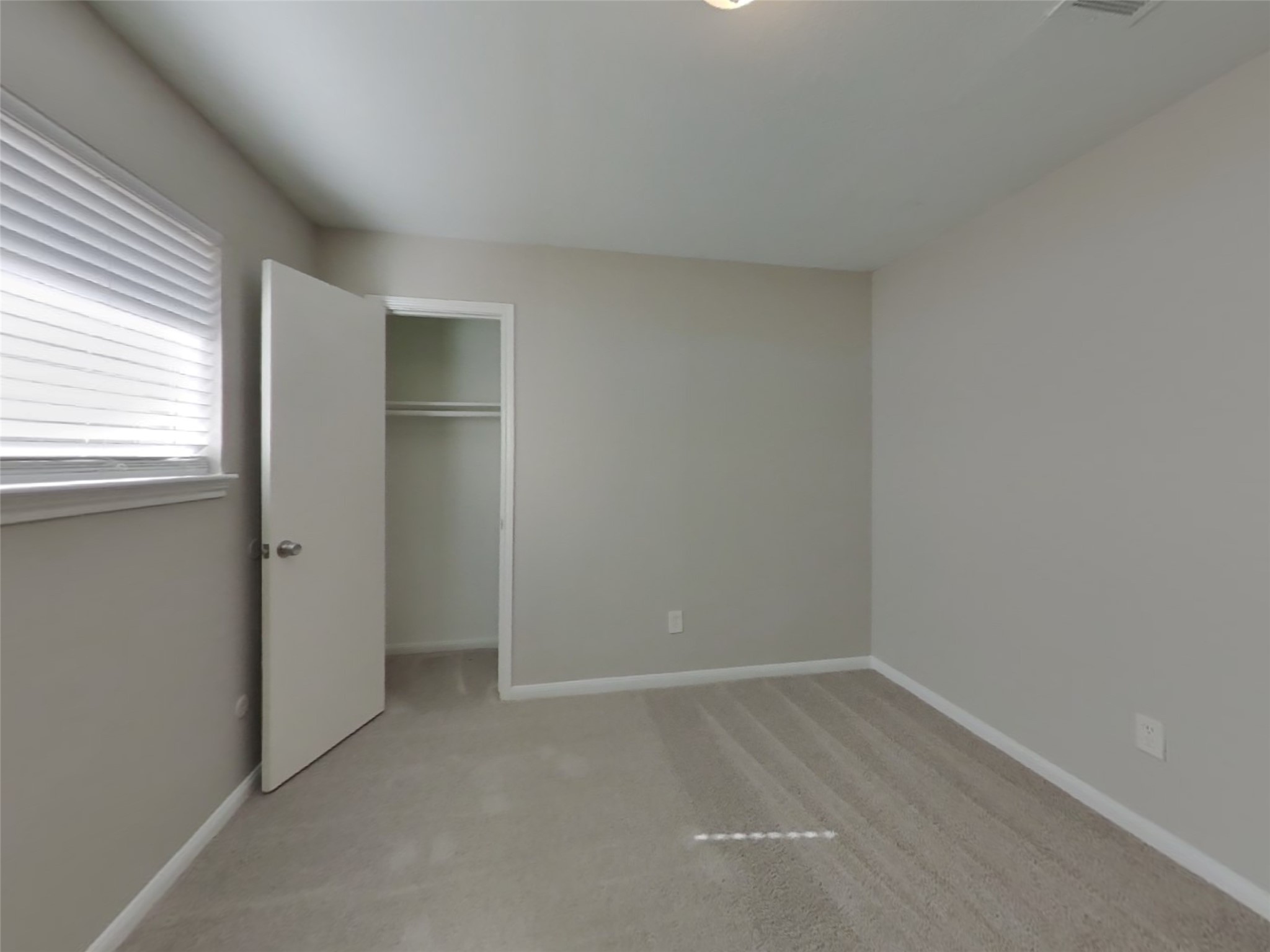 3815 Shadow Trail Houston, TX 77084 - Photo 11 of 16 an empty room with a window