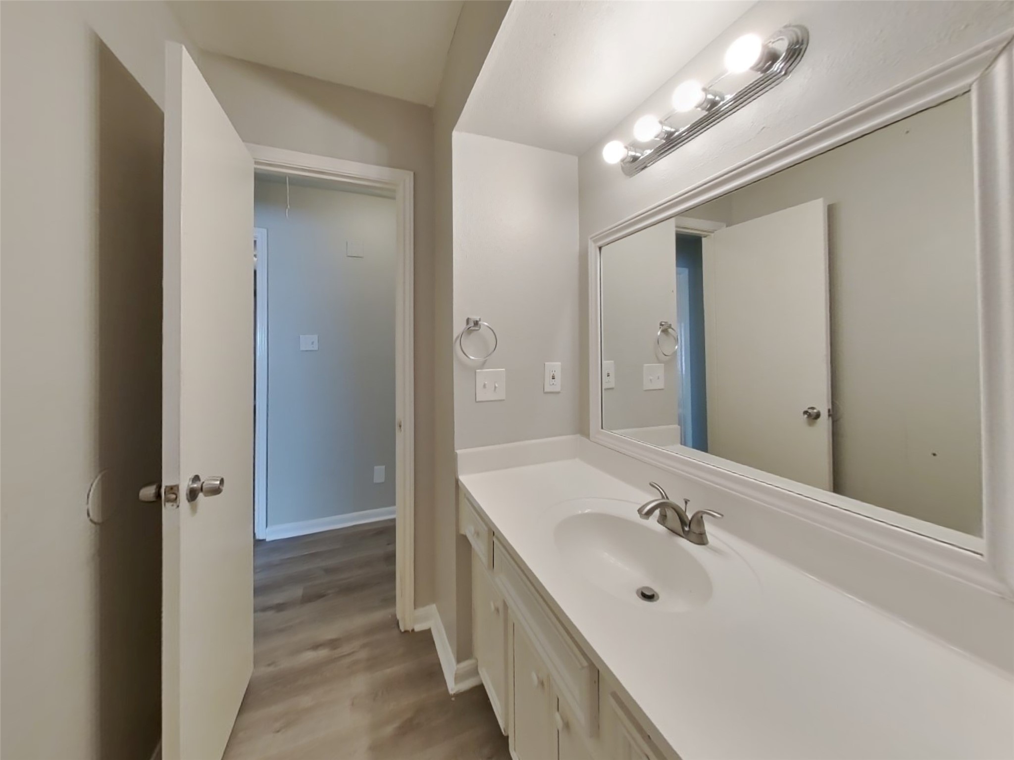3815 Shadow Trail Houston, TX 77084 - Photo 13 of 16 a bathroom with a sink a mirror and a shower