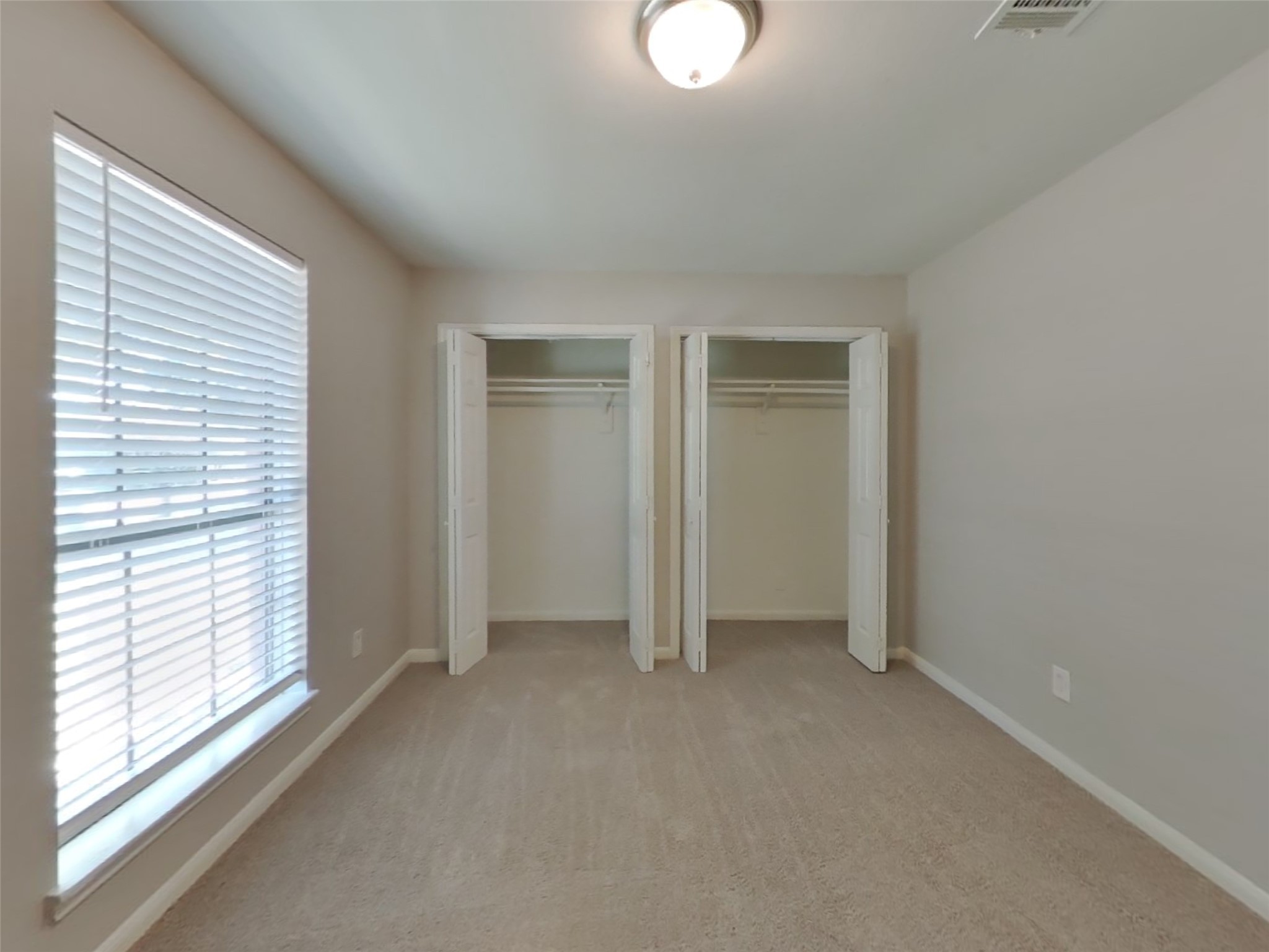 3815 Shadow Trail Houston, TX 77084 - Photo 10 of 16 a view of an empty room with a window