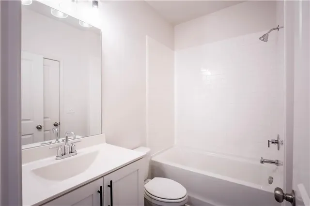 a bathroom with a sink toilet and a bathtub