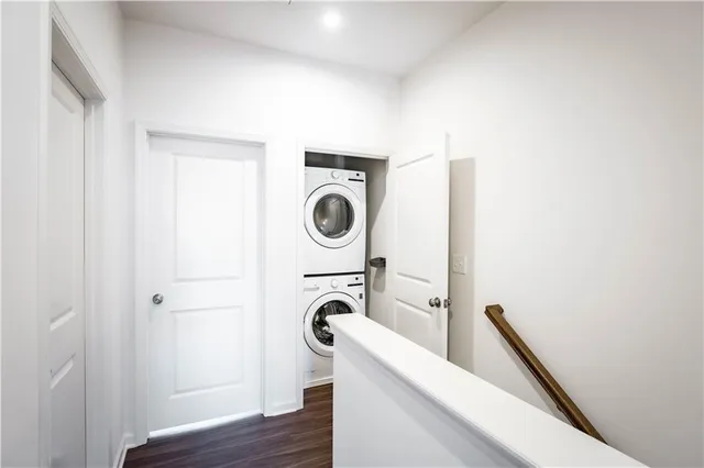 a view of storage and utility room with washer and dryer