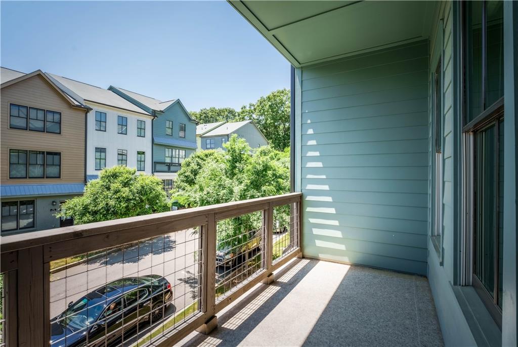 709 Needletail Way Atlanta, GA 30312 - Photo 21 of 29 a view of a balcony with wooden floor
