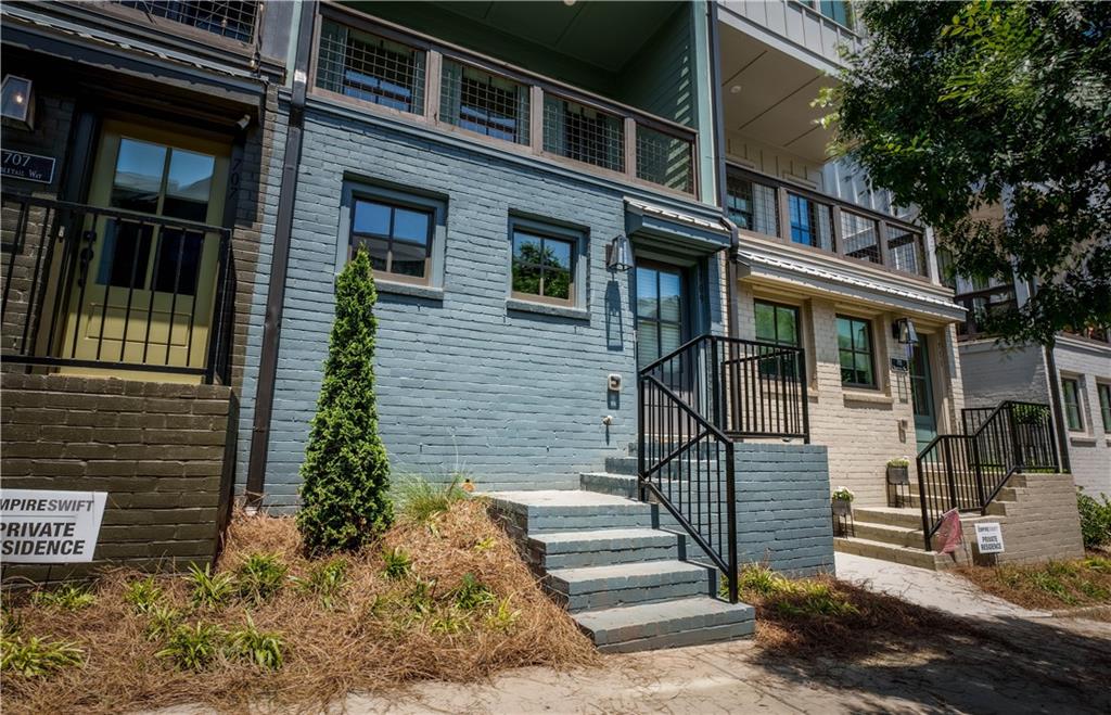 709 Needletail Way Atlanta, GA 30312 - Photo 24 of 29 a front view of a house with a yard