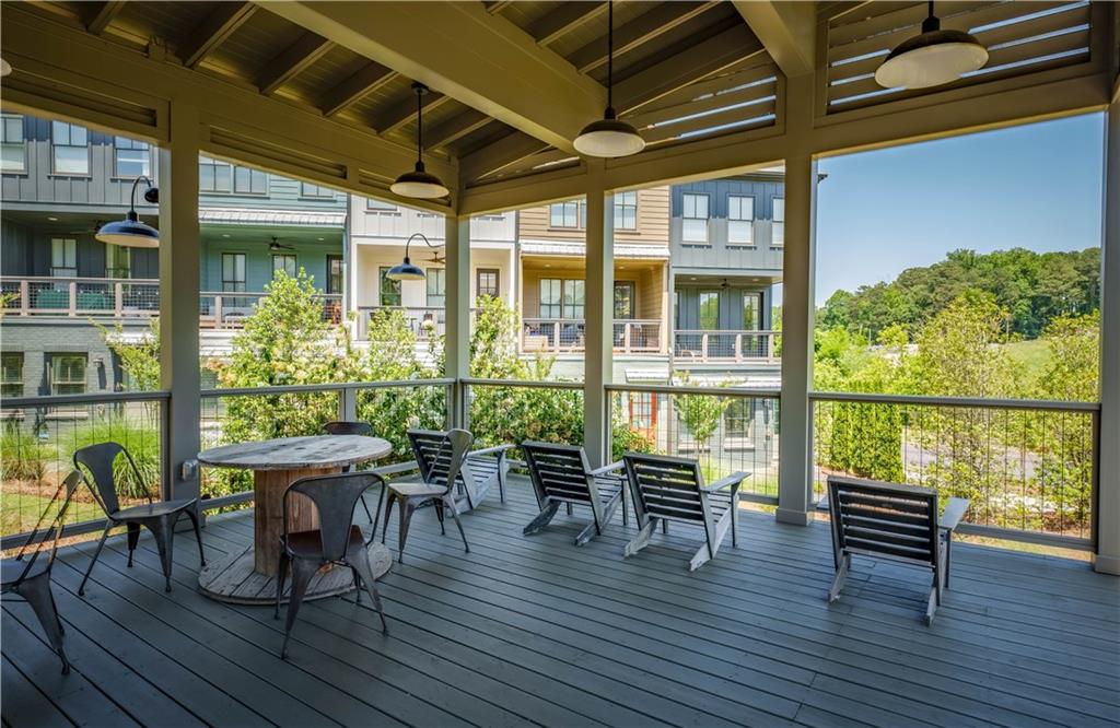 709 Needletail Way Atlanta, GA 30312 - Photo 25 of 29 a view of a dining room with furniture window and wooden floor