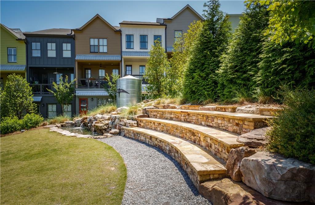 709 Needletail Way Atlanta, GA 30312 - Photo 26 of 29 a view of a house with swimming pool and sitting area