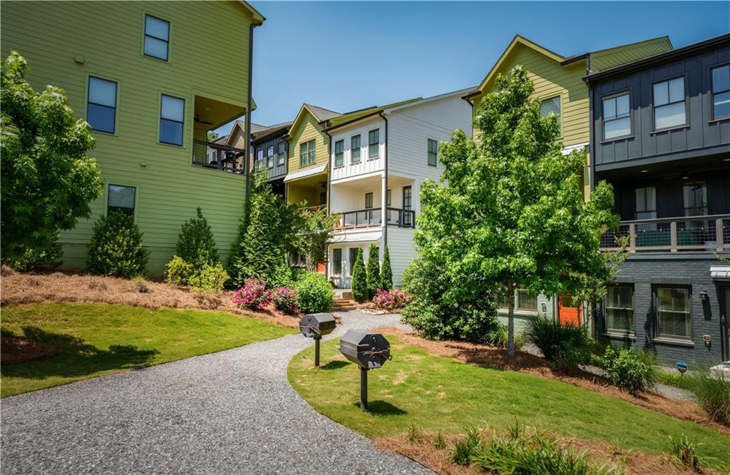 709 Needletail Way Atlanta, GA 30312 - Photo 27 of 29 a front view of a house with garden