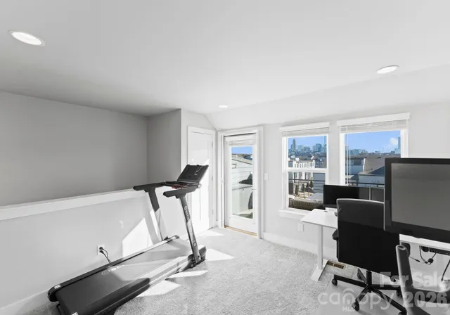 a view of a room with gym equipment