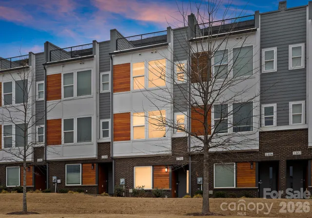 a front view of a building with glass windows