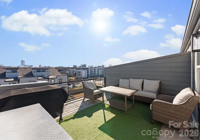 a terrace view with sitting space