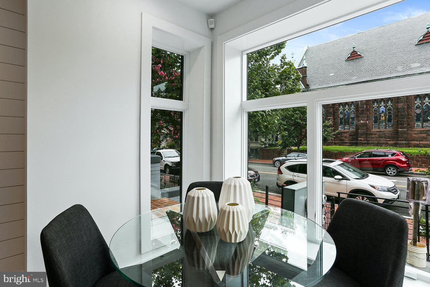 4 R Street Northwest, Unit 3 Washington, DC 20001 - Photo 11 of 28 a view of a dining room with furniture window and outside view