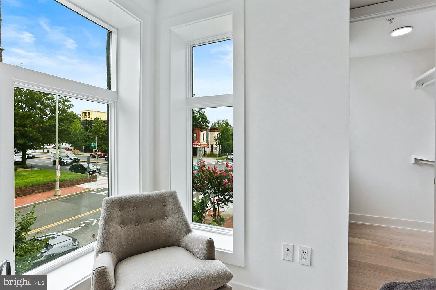 4 R Street Northwest, Unit 3 Washington, DC 20001 - Photo 18 of 28 a living room with furniture and a window