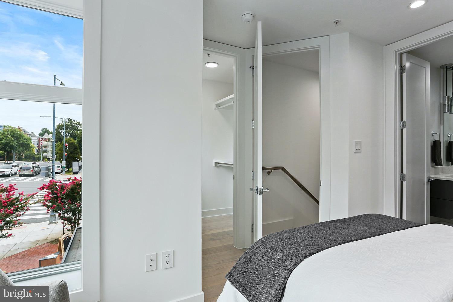 4 R Street Northwest, Unit 3 Washington, DC 20001 - Photo 22 of 28 a bedroom with a bed and a window