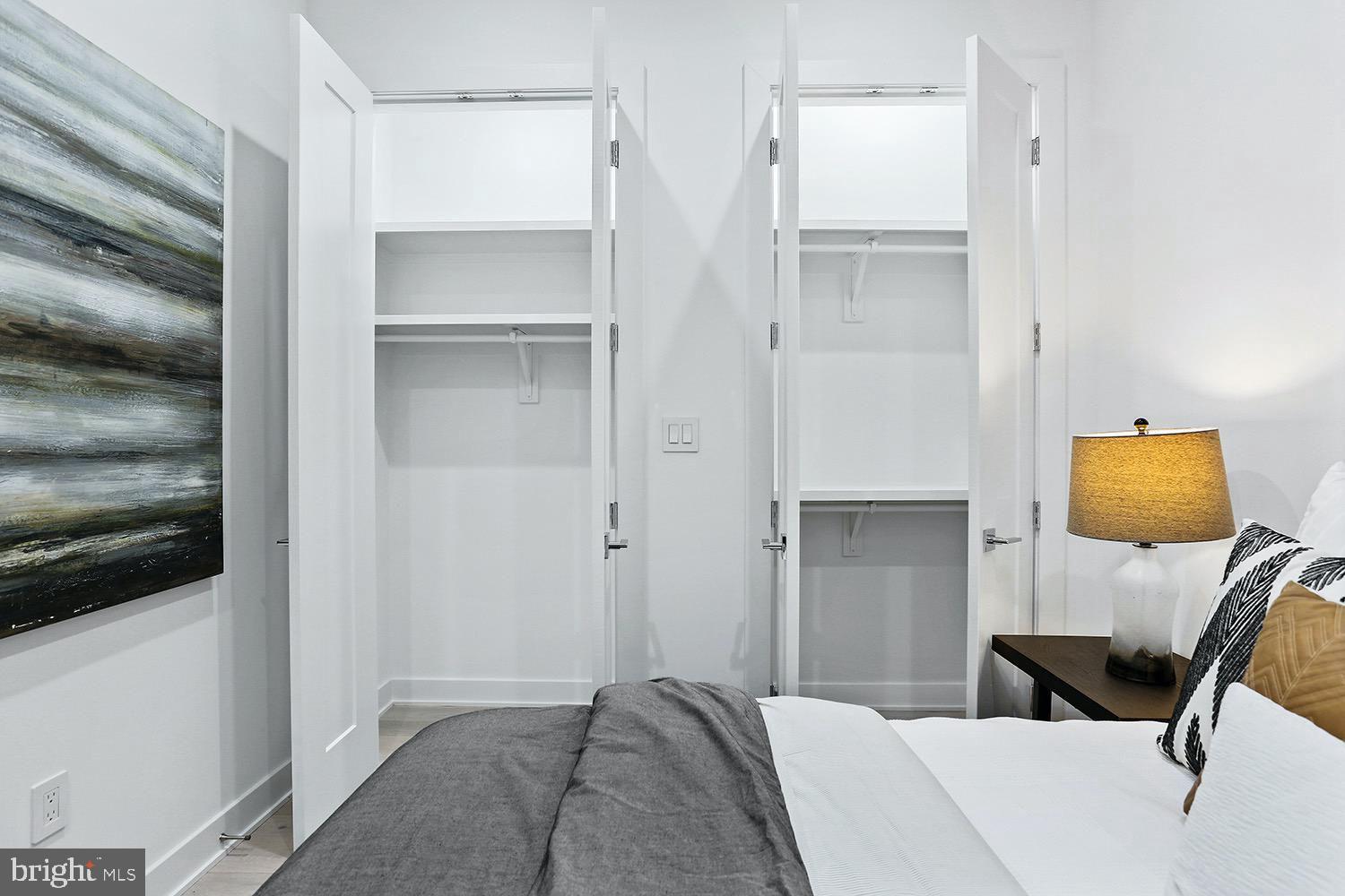 4 R Street Northwest, Unit 3 Washington, DC 20001 - Photo 24 of 28 a bedroom with a bed and chair