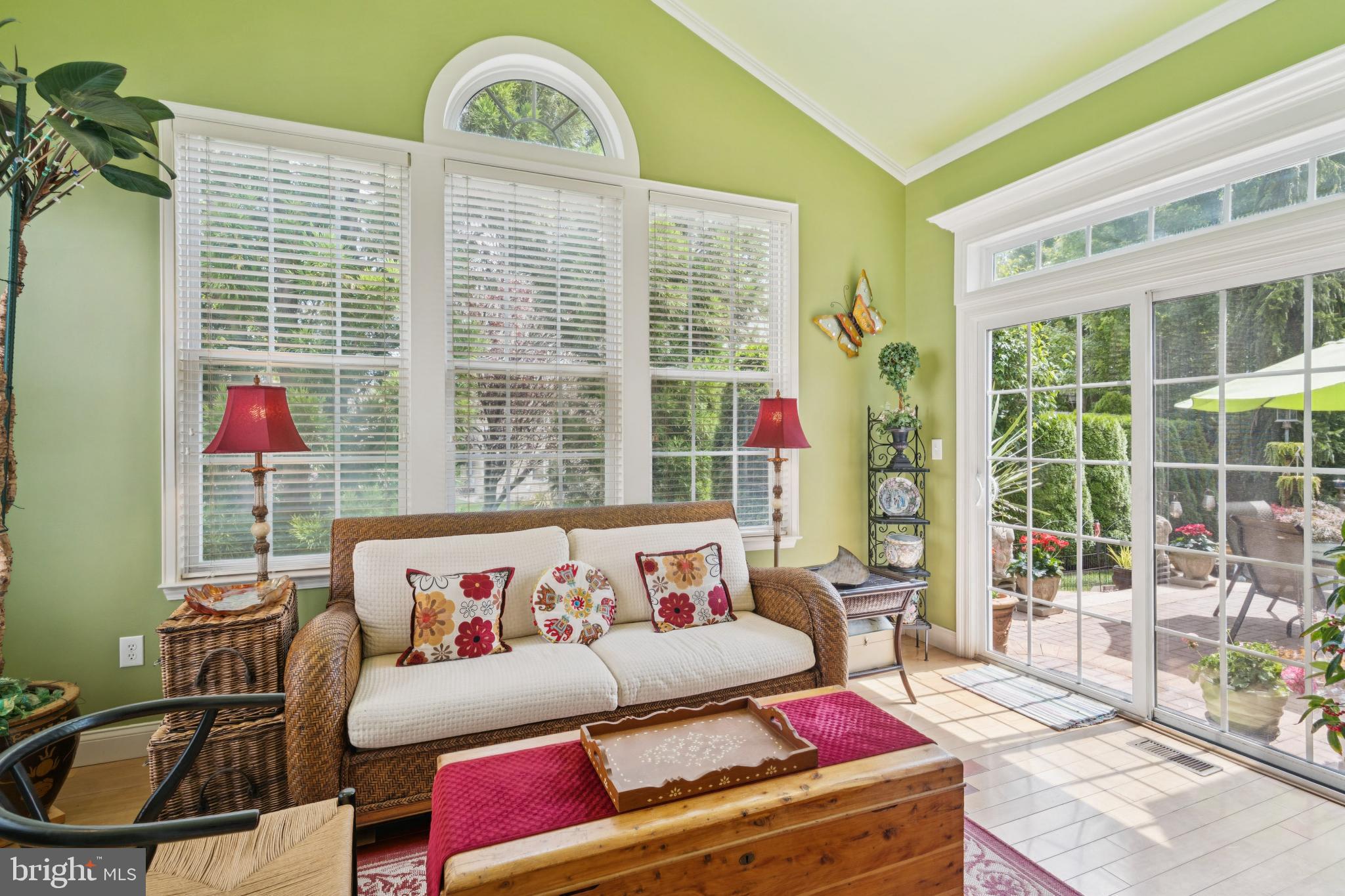 4 Running Brook Terrace Barnegat, NJ 08005 - Photo 13 of 28 Bright sunroom with lush greenery and light.