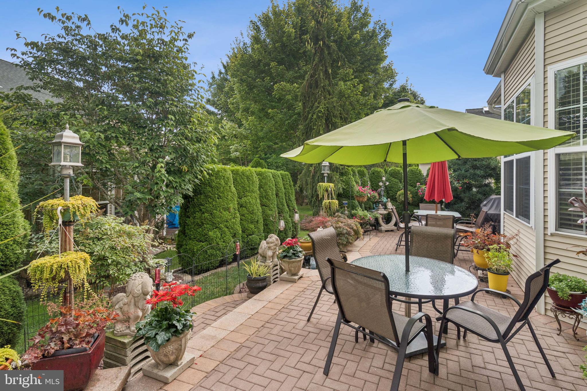 4 Running Brook Terrace Barnegat, NJ 08005 - Photo 25 of 28 Lush garden oasis with inviting patio and pond.