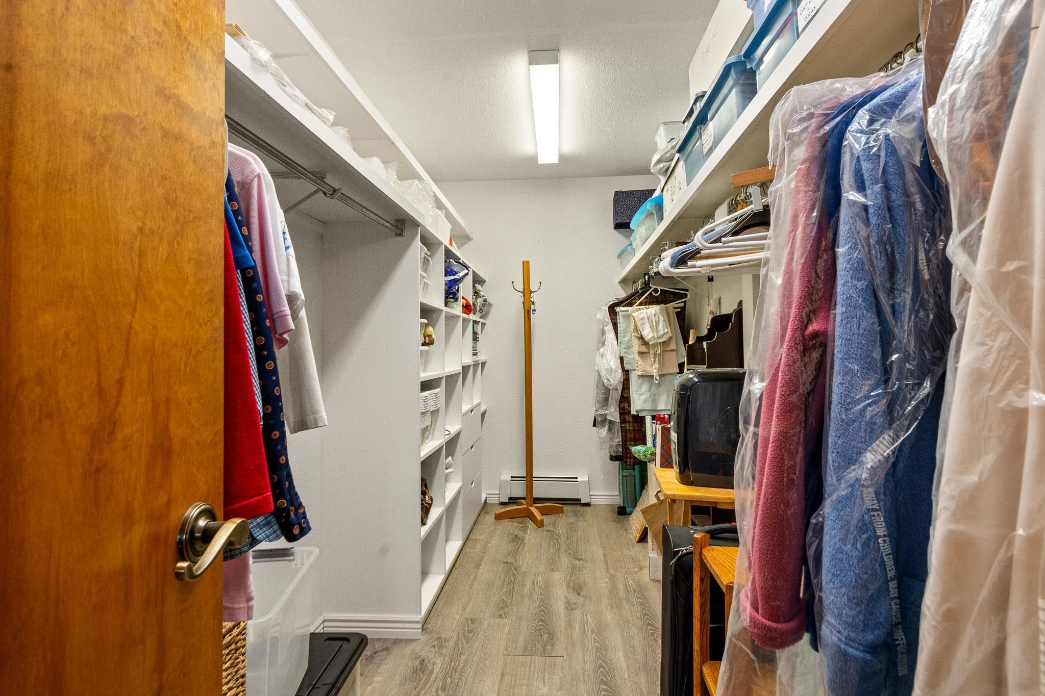 1185-17 17 1/2 Road Fruita, CO 81521 - Photo 20 of 35 a view of walk in closet with clothes and shoes