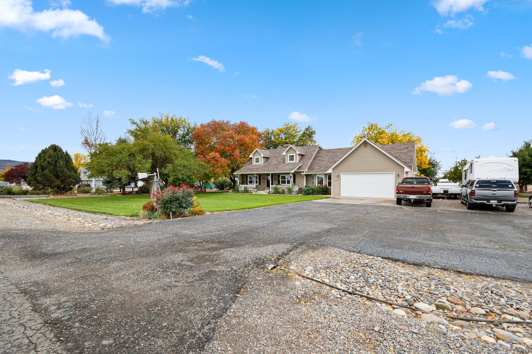 1185-17 17 1/2 Road Fruita, CO 81521 - Photo 2 of 35 a view of street with parked cars