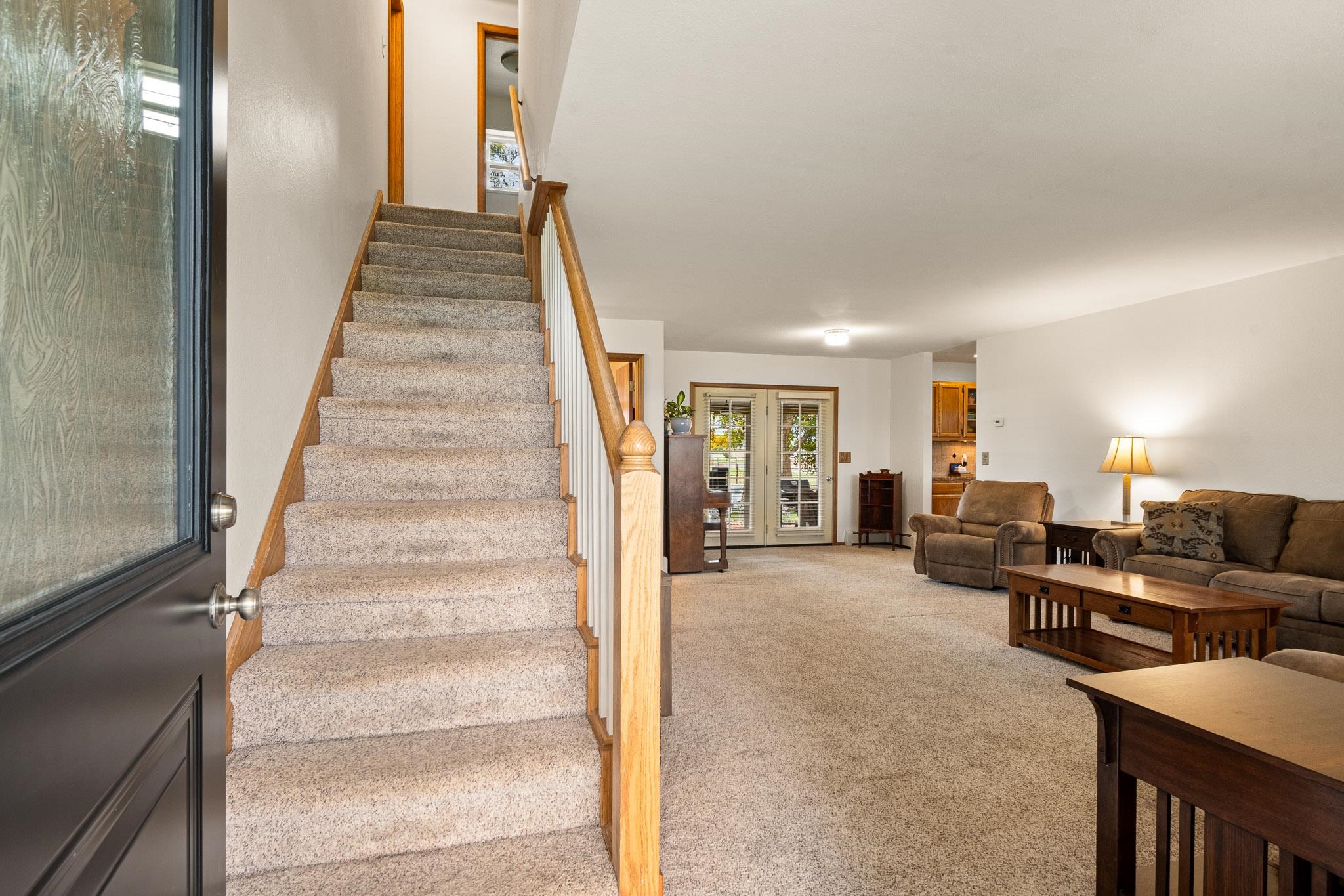 1185-17 17 1/2 Road Fruita, CO 81521 - Photo 22 of 35 a view of a livingroom with furniture and staircase