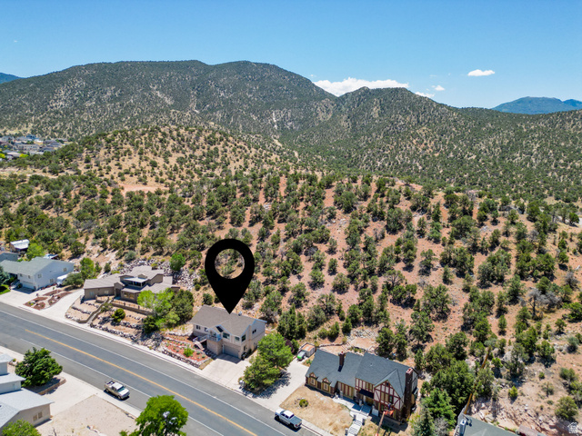 790 East Fiddlers Canyon Road Cedar City, UT 84721 - Photo 23 of 35 Hillside residential area with extensive natural landscaping and distant mountain ranges