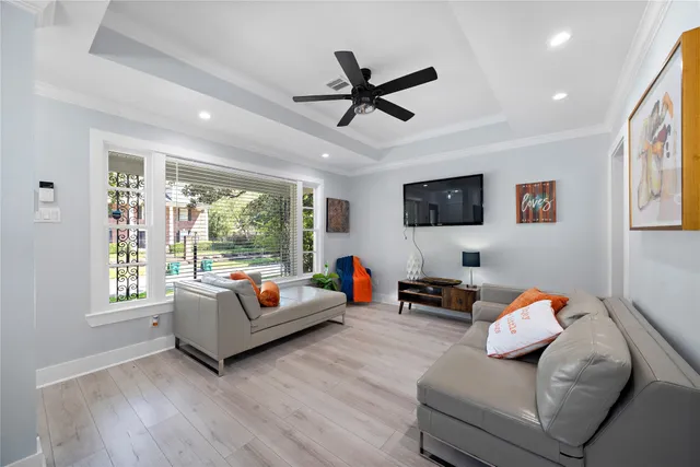 a living room with furniture and a window