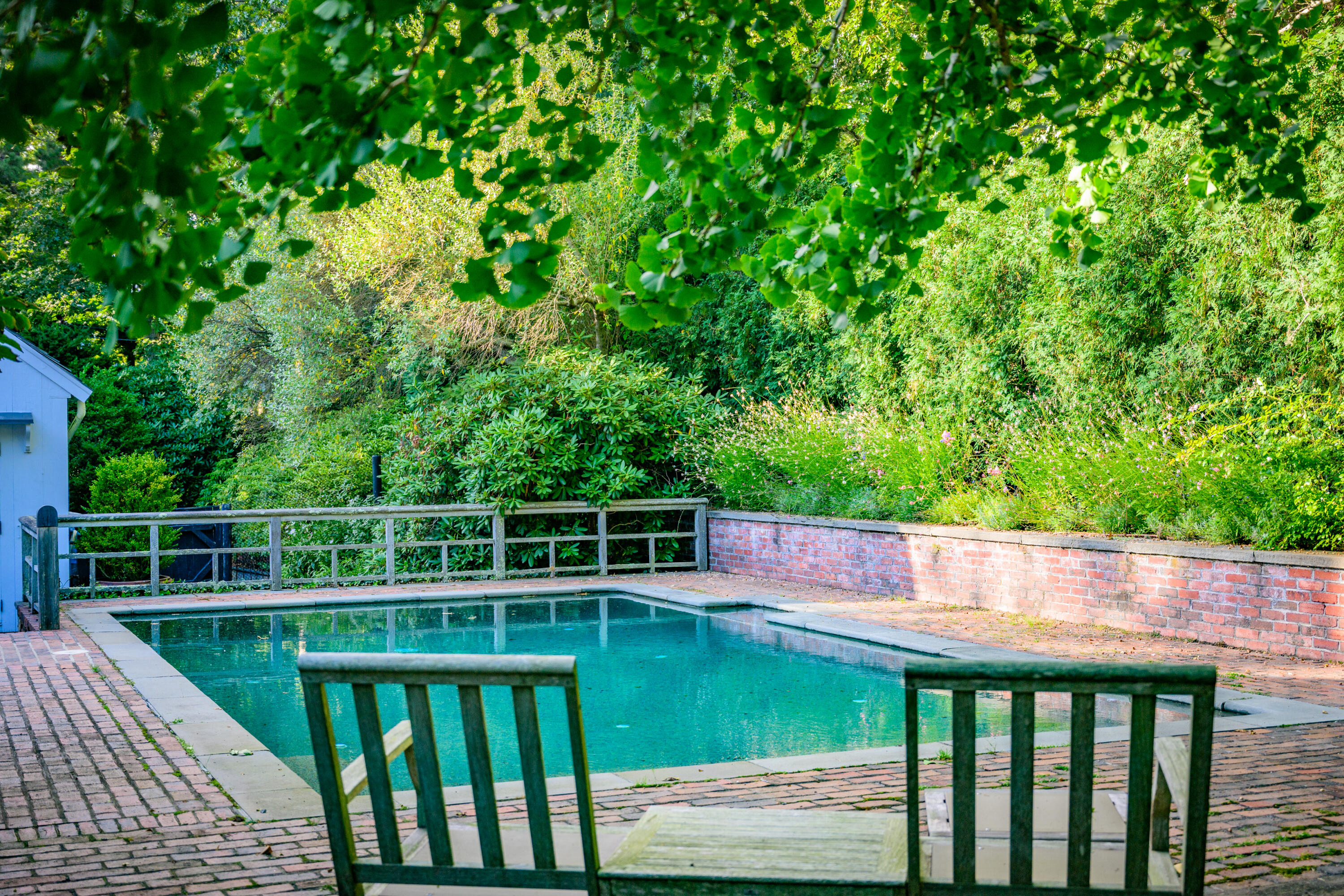 245 North Bay Road Osterville, MA 02655 - Photo 19 of 50 a view of a balcony with floor to ceiling window plants and large tree