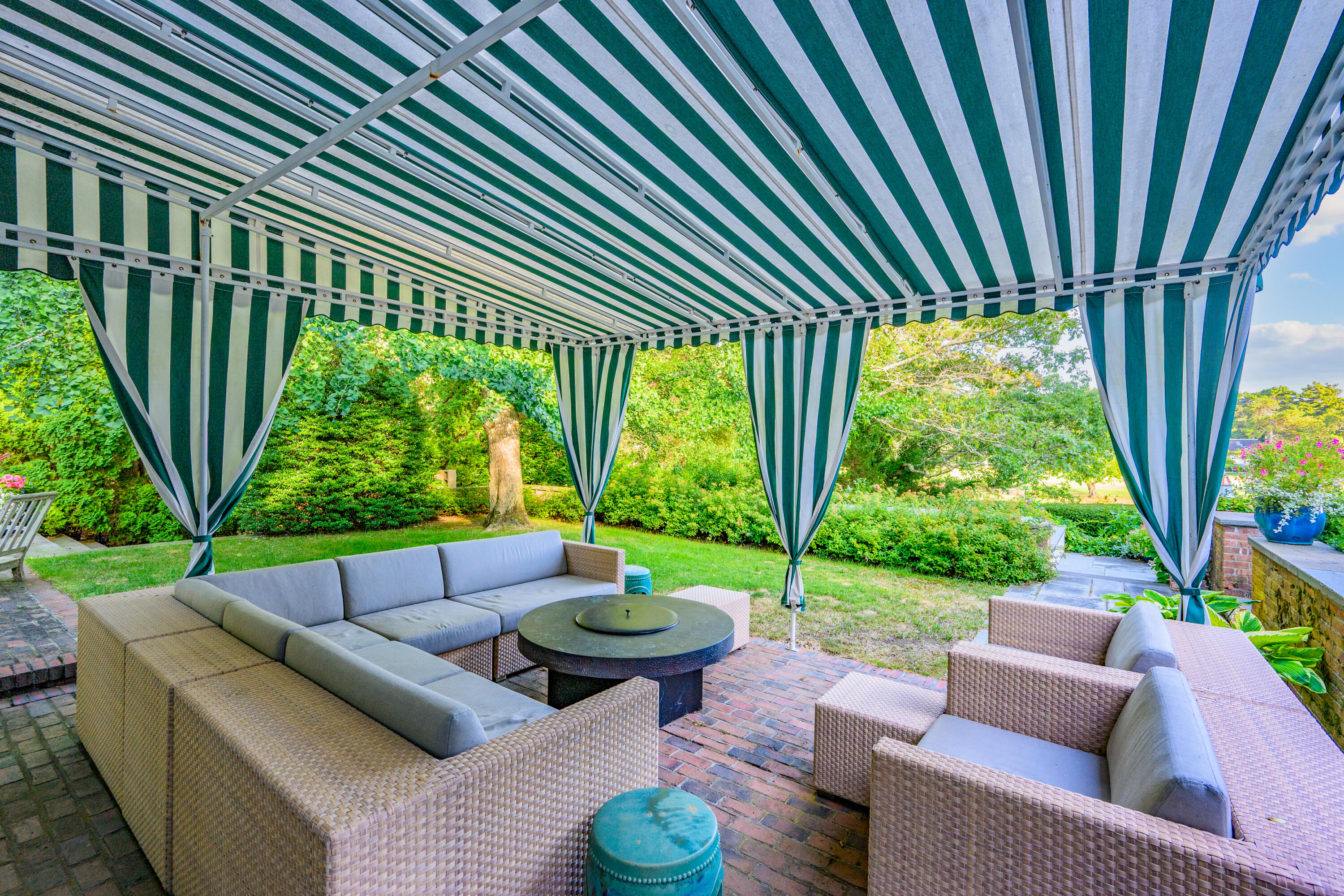 245 North Bay Road Osterville, MA 02655 - Photo 20 of 50 a view of a patio in the backyard