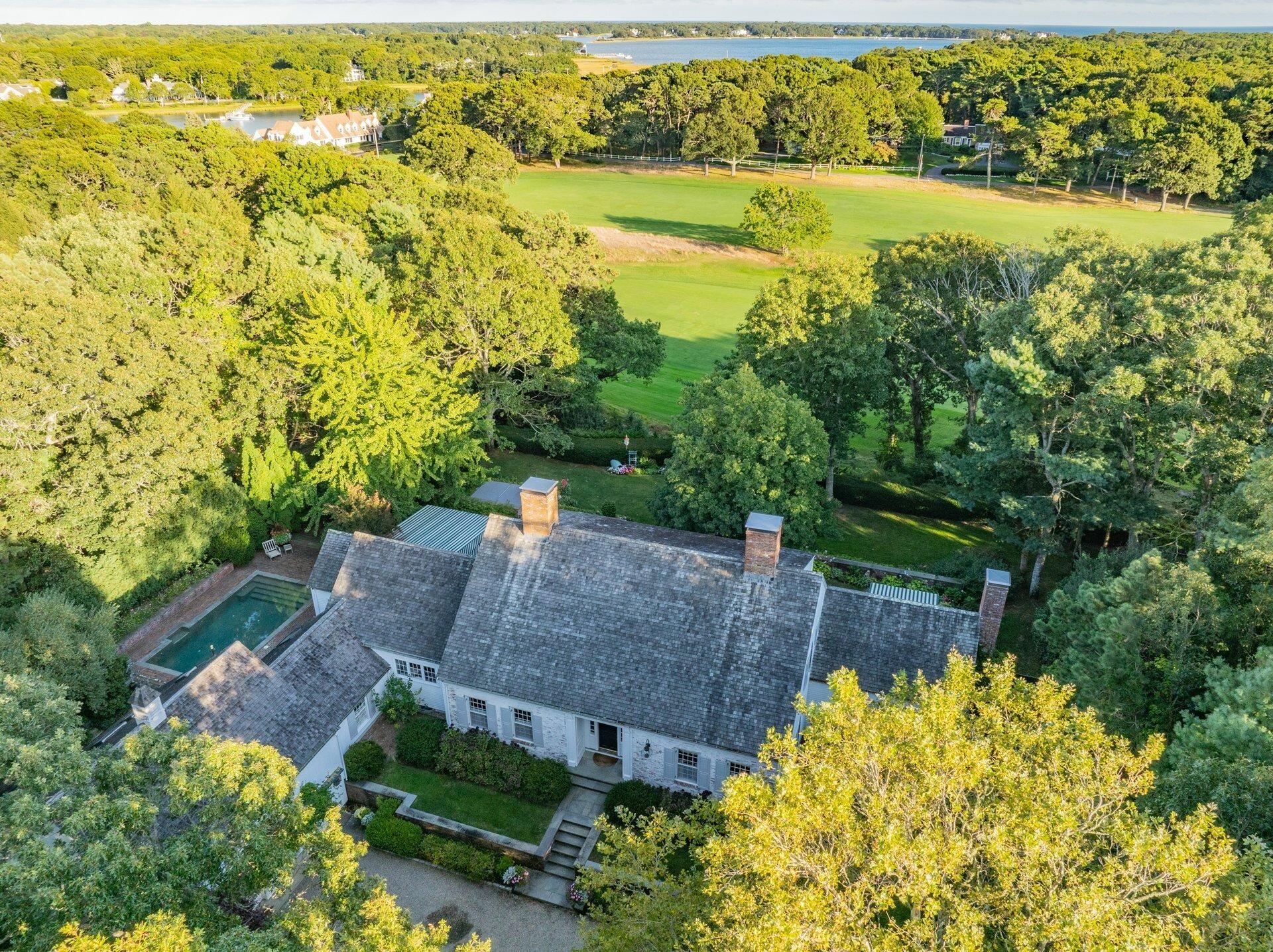 245 North Bay Road Osterville, MA 02655 - Photo 2 of 50 an aerial view of house with yard swimming pool and outdoor seating