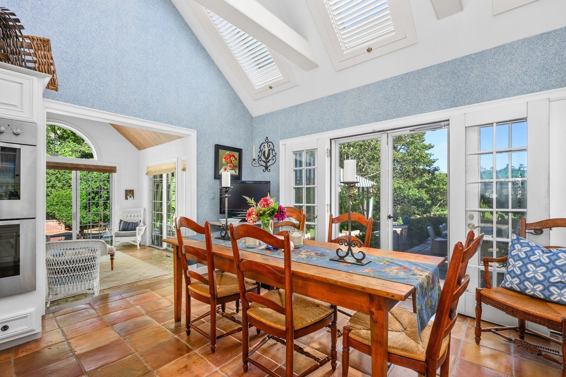 245 North Bay Road Osterville, MA 02655 - Photo 23 of 50 a dining room with furniture large windows and a chandelier