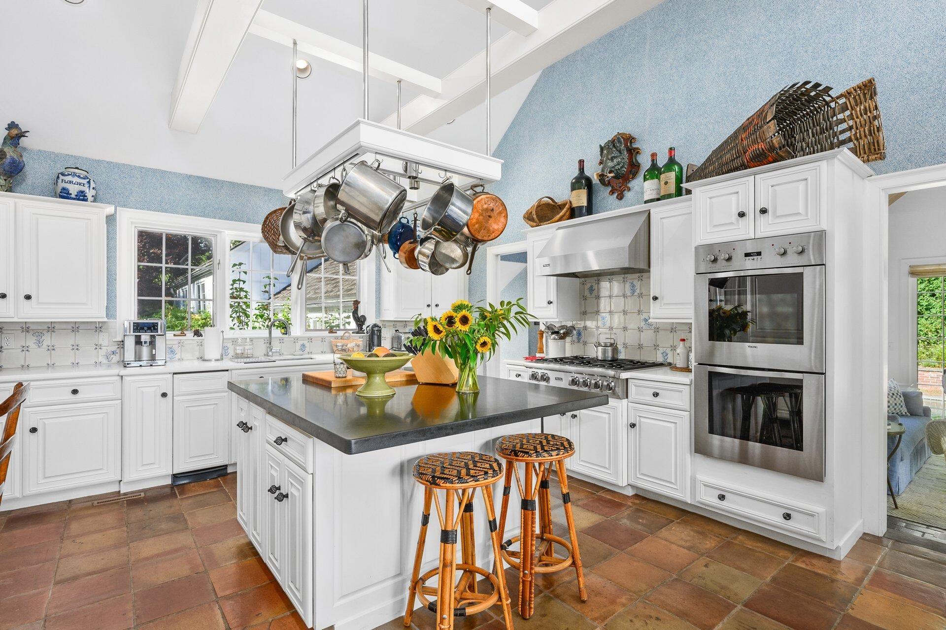 245 North Bay Road Osterville, MA 02655 - Photo 24 of 50 a kitchen with stainless steel appliances granite countertop a stove and cabinets