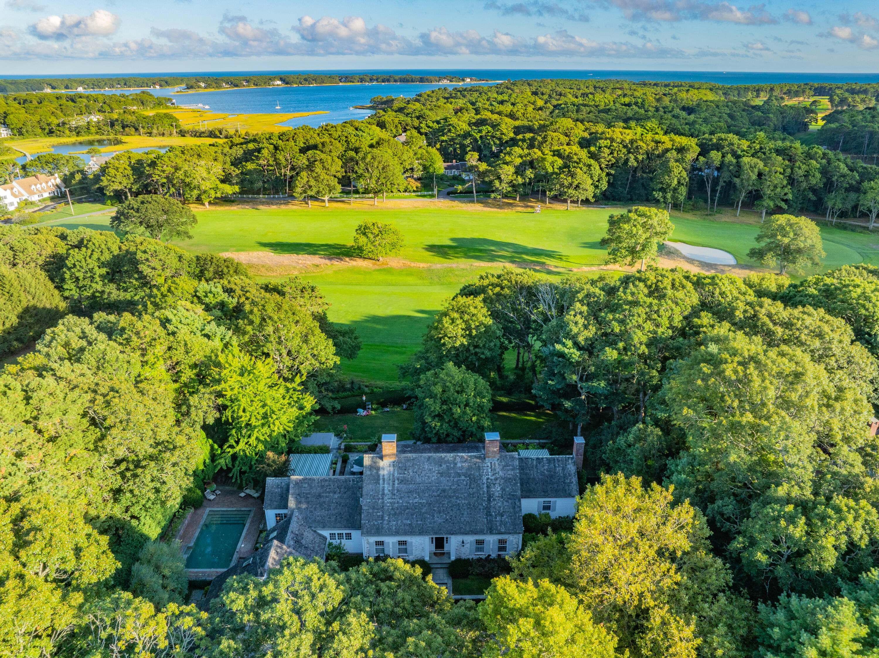 245 North Bay Road Osterville, MA 02655 - Photo 36 of 50 a view of a garden with an outdoor space