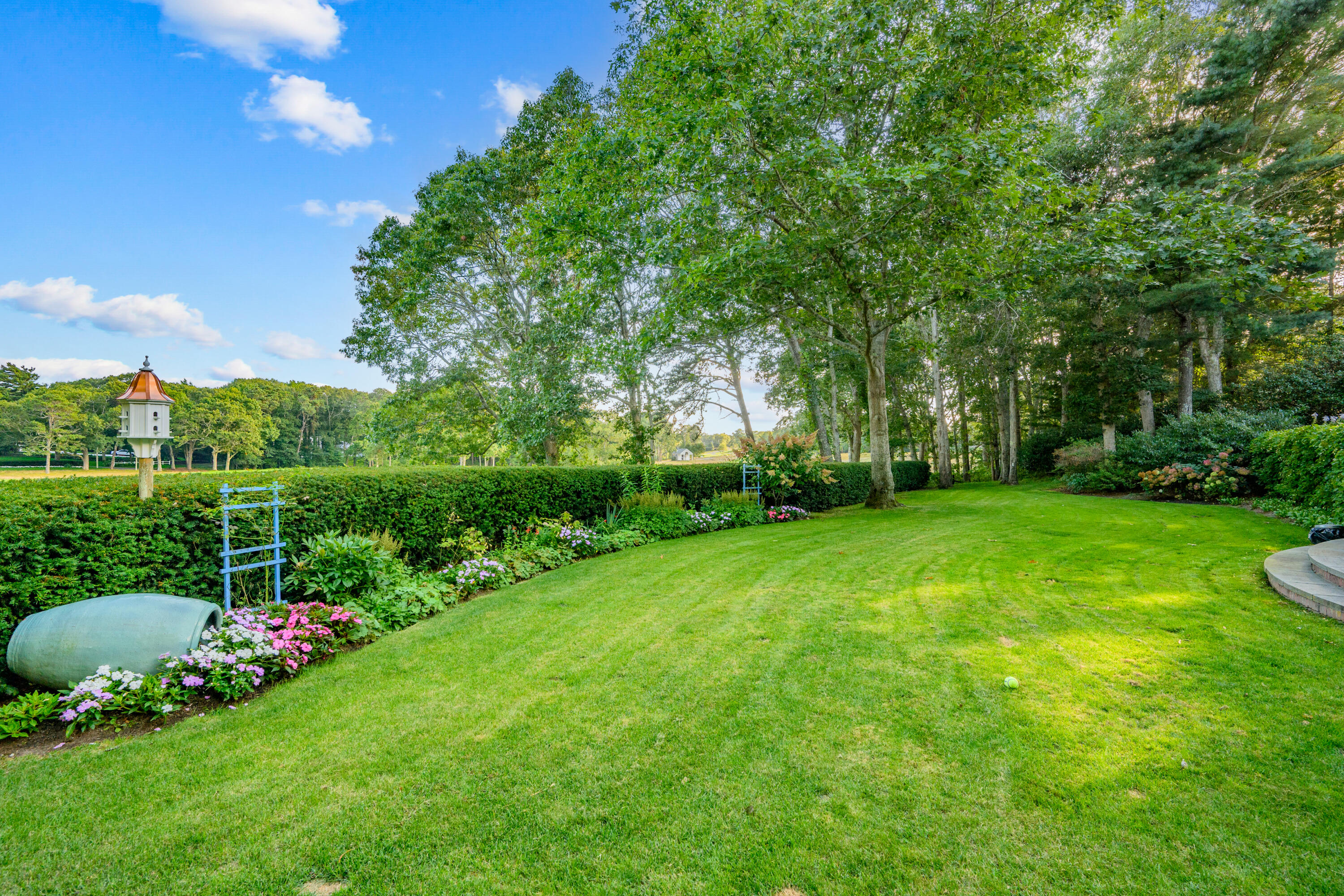 245 North Bay Road Osterville, MA 02655 - Photo 42 of 50 a view of a garden and basketball court