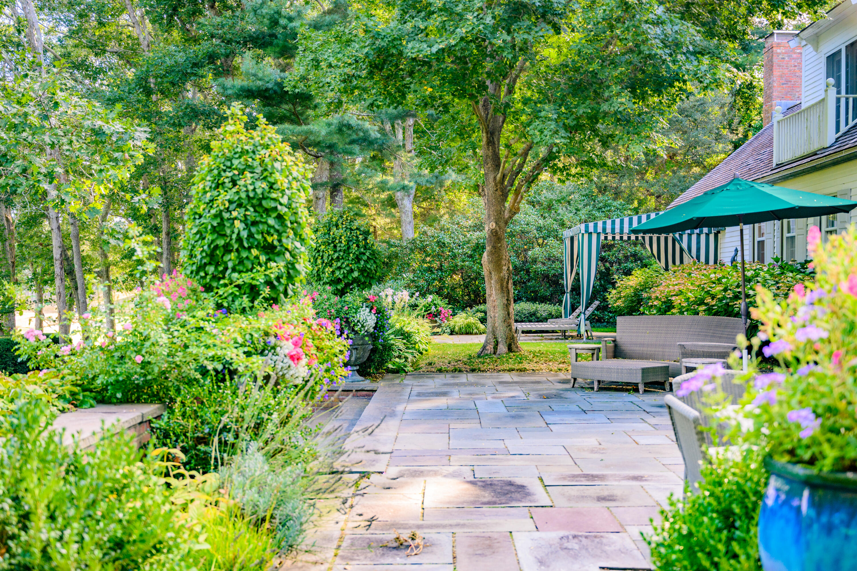 245 North Bay Road Osterville, MA 02655 - Photo 6 of 50 a view of backyard with plants and outdoor seating