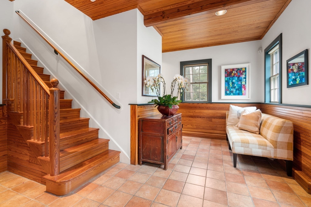 164 Forest Street, Unit 164 Sherborn, MA 01770 - Photo 14 of 32 a living room with furniture and a painting on the wall