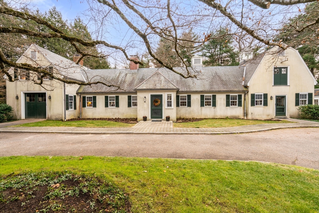 164 Forest Street, Unit 164 Sherborn, MA 01770 - Photo 3 of 32 a view of a yard in front of a house