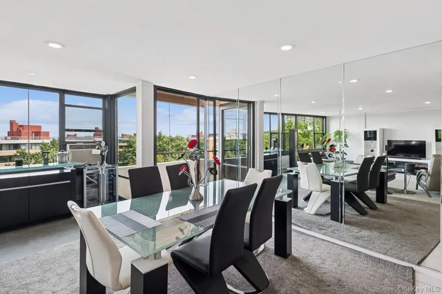 a view of a dining room with furniture window and outside view