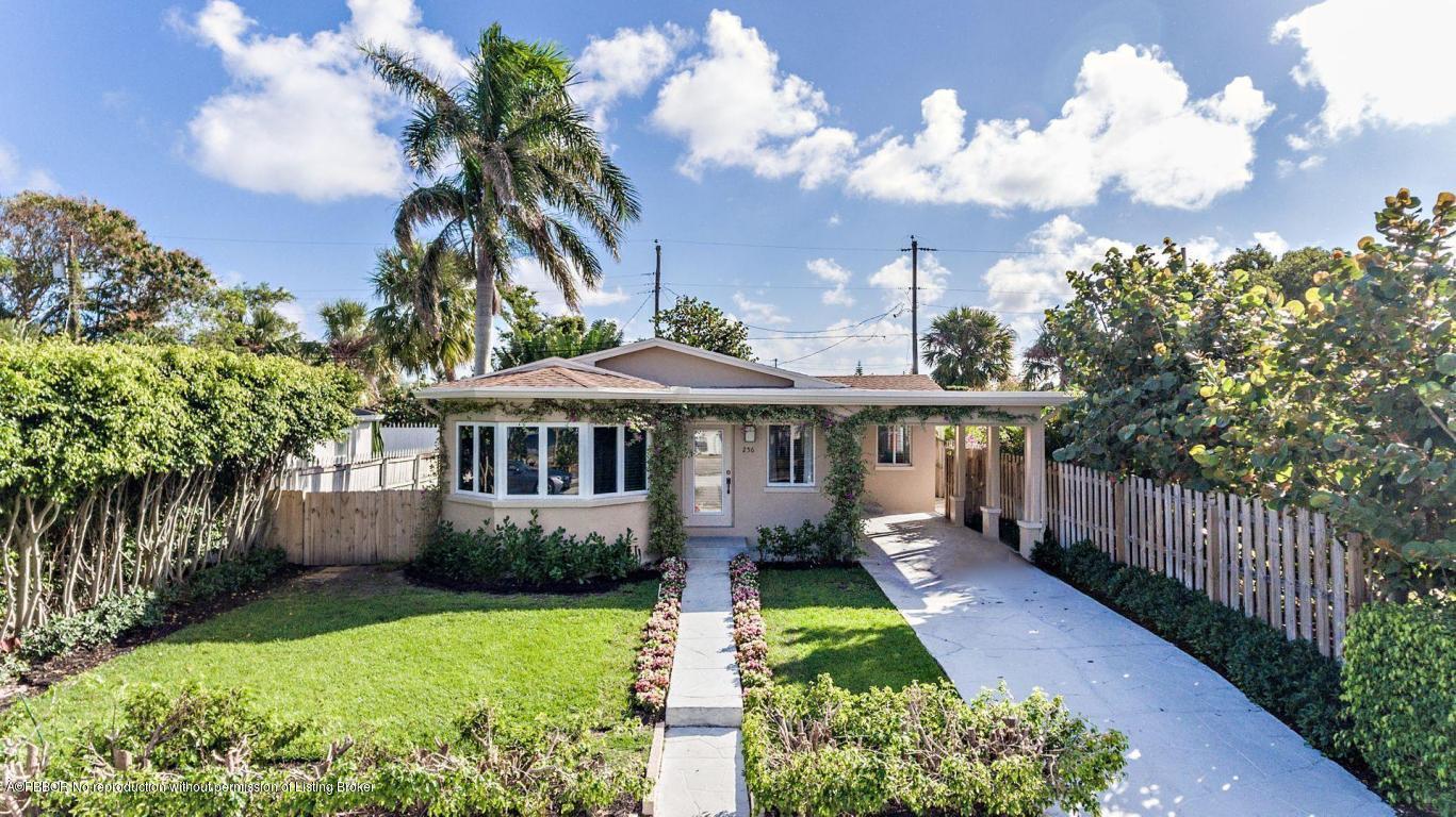 256 Alpine Road West Palm Beach, FL 33405 - Photo 21 of 26 a front view of a house with garden