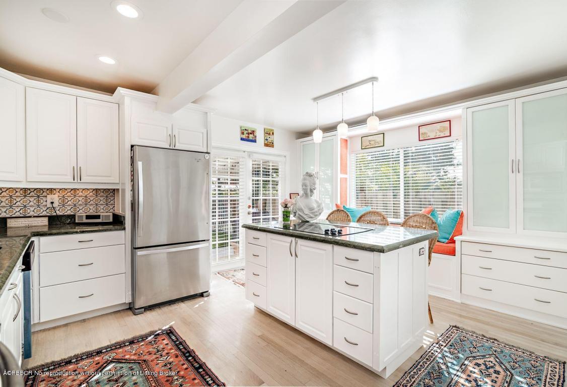 256 Alpine Road West Palm Beach, FL 33405 - Photo 8 of 26 a kitchen with granite countertop a sink stove and refrigerator