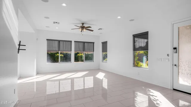 a view of entryway with window and front door