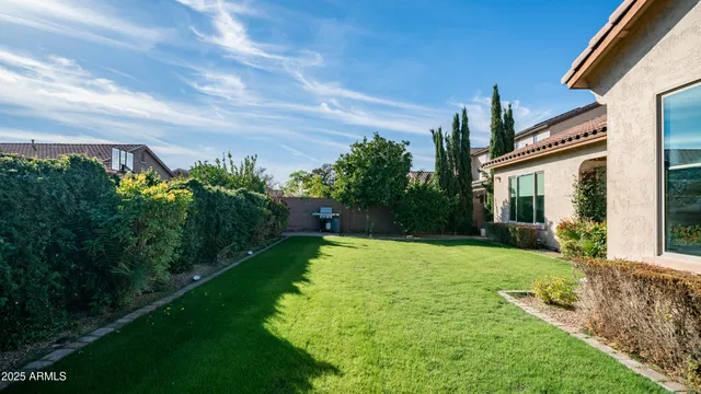 a house with garden in front of it