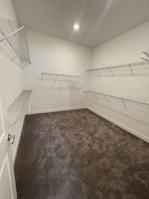 5936 Southwest 90th Court Road Ocala, FL 34481 - Photo 19 of 28 a view of a room with racks on the wall