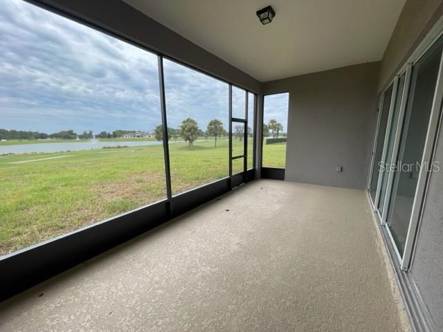 5936 Southwest 90th Court Road Ocala, FL 34481 - Photo 27 of 28 a view of an empty room with a large window