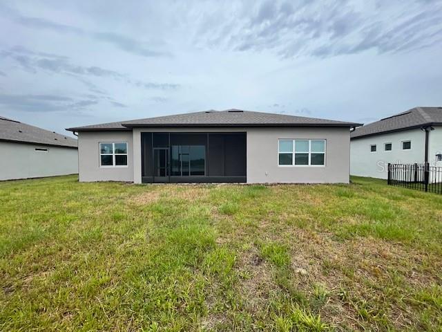 5936 Southwest 90th Court Road Ocala, FL 34481 - Photo 28 of 28 a house with a tree in front of it