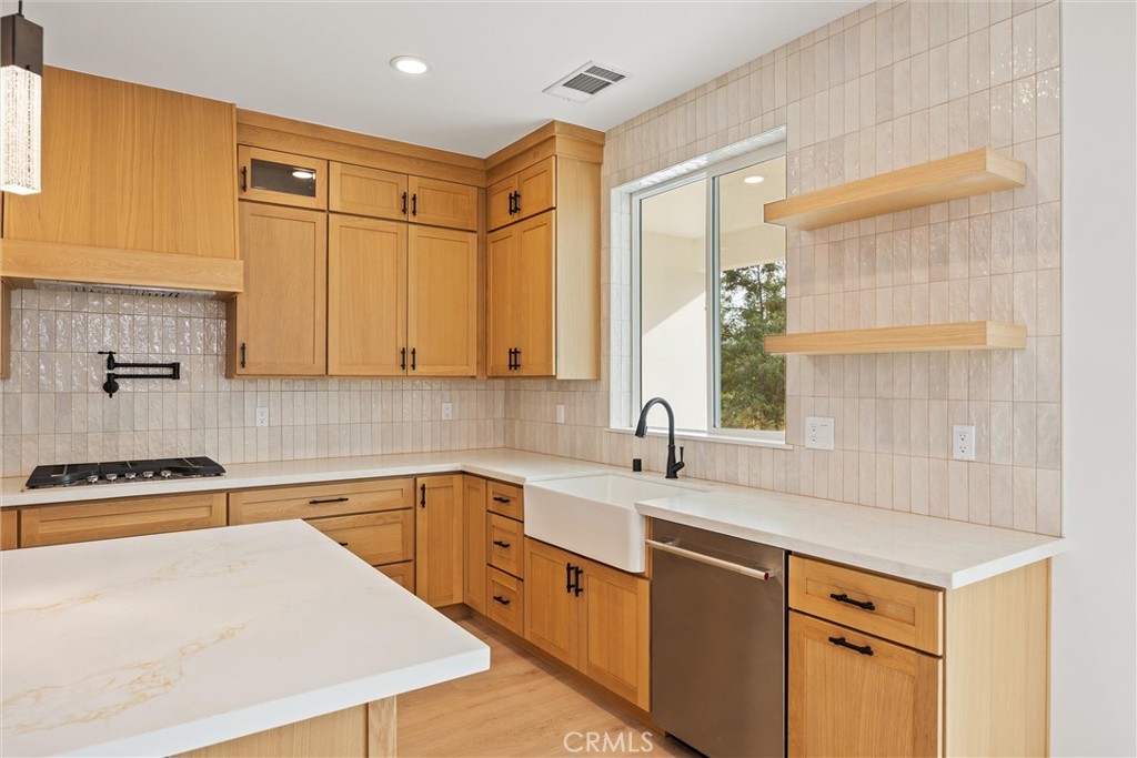 6006 Kibler Road Paradise, CA 95969 - Photo 19 of 43 a kitchen with a sink a stove and cabinets
