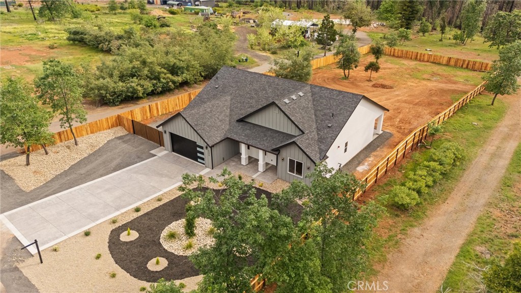 6006 Kibler Road Paradise, CA 95969 - Photo 3 of 43 an aerial view of a house with a yard and lake view